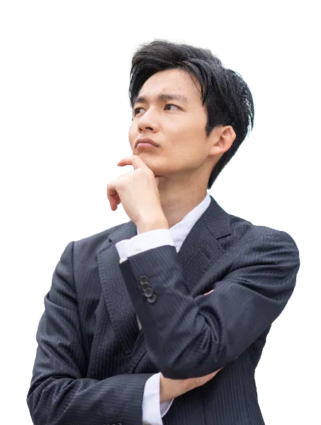 考え込むスーツ姿の男性